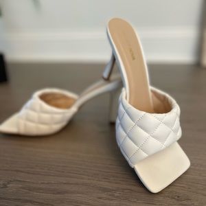 White patten leather mules heels